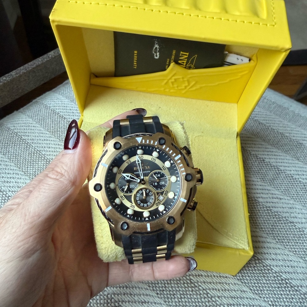 Invicta Black and Gold Chronograph Watch